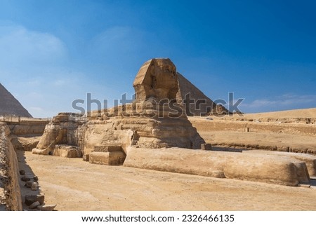 The Great Sphinx at the Giza pyramid complex,  Giza necropolis is home to the Great Pyramid, the Pyramid of Khafre, and the Pyramid of Menkaure, 
 in Cairo, Egypt Royalty-Free Stock Photo #2326466135