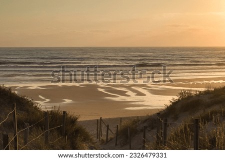 some Pictures of the Beach of Montalivet at Sunset and some sandy Ways