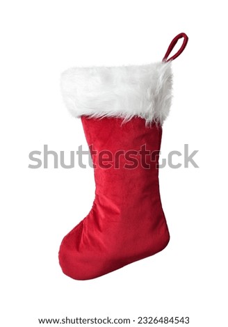 Red velvet Christmas stocking with white fur isolated cutout on white background