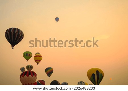 Enchanting Dawn Adventure: Colorful Hot Air Balloon Soaring in Majestic 4K Splendor
