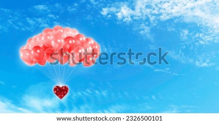 Red heart-shaped diamond and red balloons bright sky background valentines day concept