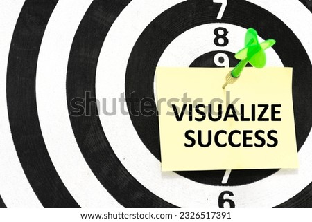 Dart board game target of Visualize success on paper. 
dream come true concept.