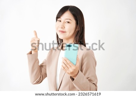 Asian middle aged office worker with the smartphone thumbs up gesture in white background round