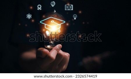 Hands showing graduation hat, Internet education course degree, E-learning graduate certificate program concept. study knowledge to creative thinking ideas and problem-solving solutions. Royalty-Free Stock Photo #2326574419
