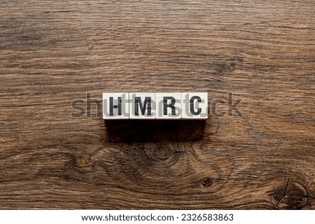 HMRC - majestys revenue and customs,word concept on building blocks, text, letters