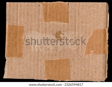Ripped piece of torn cardboard. Kraft paper background and texture effect