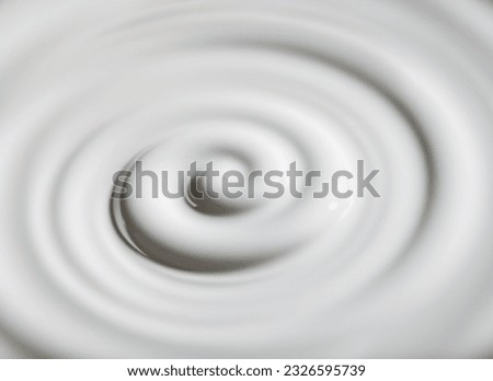 A Close-Up Shot of White Liquid Swirl Royalty-Free Stock Photo #2326595739