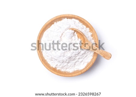 White powder in wooden bowl isolated on white background with clipping path. Royalty-Free Stock Photo #2326598267