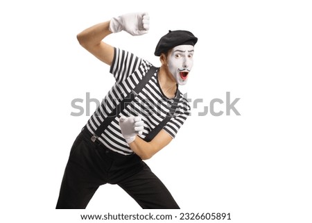 Pantomime man peeking from behind an invisible wall isolated on white background Royalty-Free Stock Photo #2326605891