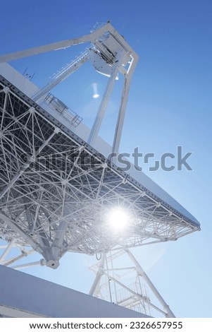 Radio telescope counter reflector against the blue sky