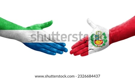 Handshake between Peru and Sierra Leone flags painted on hands, isolated transparent image.