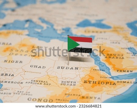 The Flag of Sudan on the World Map. Royalty-Free Stock Photo #2326684821