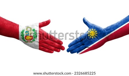 Handshake between Namibia and Peru flags painted on hands, isolated transparent image.