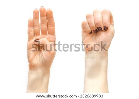 Signal, stop gesture that can help woman,children, people experiencing domestic violence. Hand with bruise,sign showing that one is victim of domestic Violence.social protection,defense concept Royalty-Free Stock Photo #2326689983