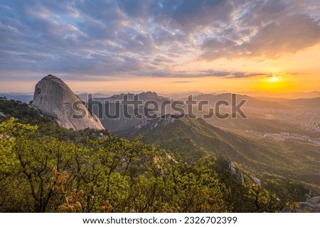 Sunrise at Bukhansan Mountain in Seoul. The beauty of nature. at Bukhansan National Park A mountain that is popular with tourists from all over the world visiting Seoul, South Korea. Royalty-Free Stock Photo #2326702399