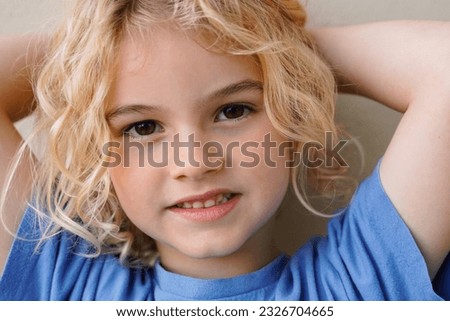 Authentic shot of child kid smiling on camera - Real people portrait Royalty-Free Stock Photo #2326704665