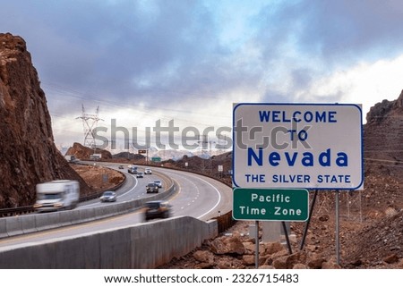 Nevada Welcomes You: Iconic Road Sign Board with Bustling Traffic, Inviting in 4K Resolution