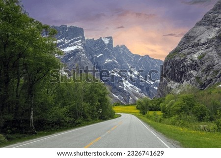 The Troll Wall (English) or Trollveggen (Norwegian) is part of the mountain massif Trolltindene (Troll Peaks) in the Romsdalen valley in Rauma Municipality in Moere og Romsdal county, Norway.  Royalty-Free Stock Photo #2326741629