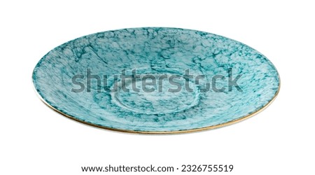 Empty turquoise saucer cutout. Beautiful porcelain dessert plate textured of blue marble isolated on a white background. Porcelain tableware for food design. Crockery concept. Front view. Royalty-Free Stock Photo #2326755519