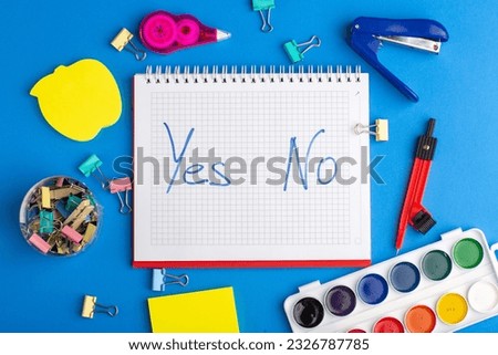 top view open copybook with paints stickers on blue background drawing color paint copybook notepad