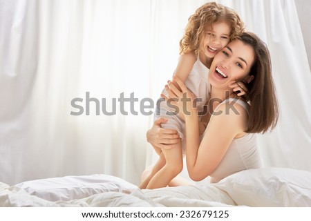 happy mother holding her child