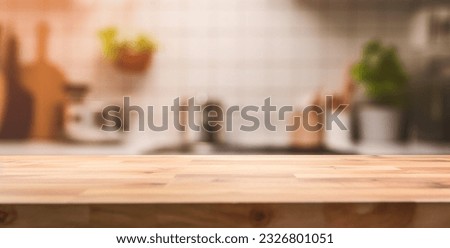 wood table in kitchen blurred background