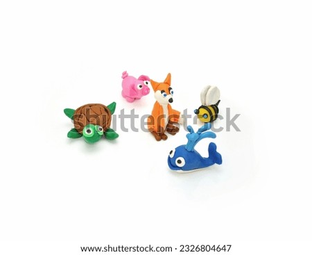 a set of animals made of plasticine isolated on white