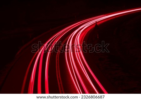 lights of cars driving at night. long exposure Royalty-Free Stock Photo #2326806687