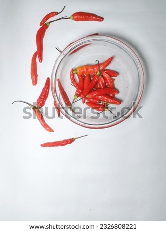 Red chili pepper isolated on a white background. Top view, flat. suitable for banners, posts, social media, news, food media