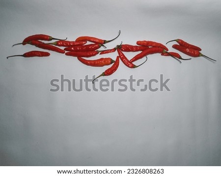 Red chili pepper isolated on a white background. Top view, flat. suitable for banners, posts, social media, news, food media