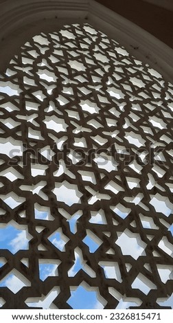 An Islamic geometric design window, Islamic arabesque, seamless pattern. Royalty-Free Stock Photo #2326815471