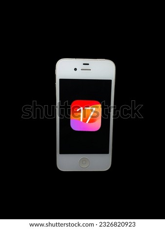 number 17 displayed on a smartphone (iOS 17 on iPhone 4) Royalty-Free Stock Photo #2326820923