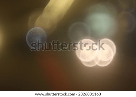 Bokeh or blur image of park lights and cars in Blok M, South Jakarta, Indonesia, January 9, 2023 Royalty-Free Stock Photo #2326831163