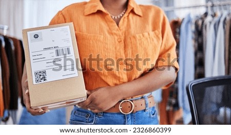Hands, designer or woman with box for delivery, shipping or package with logistics in ecommerce in office. Closeup, fashion or business owner with clothes stock or store order for courier service