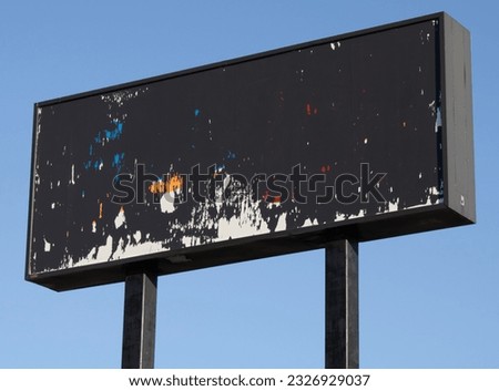 Old empty billboard for abandoned store