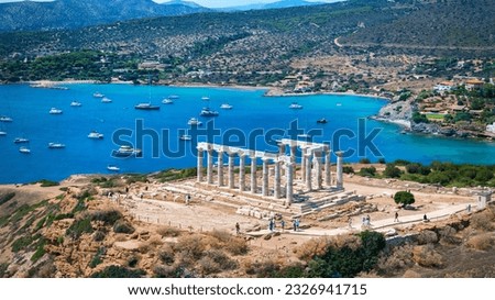 Aerial close up view of the ancient Temple of Poseidon at Cape Sounion, Greece, popular monument for tourists Royalty-Free Stock Photo #2326941715