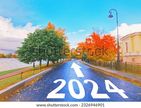 Empty car road drive, arrow sign path view. New year 2024 next goal. Trip way start, travel ahead 2025 end job 2023 Future trend blue sky, life plan change, fresh hope growth begin, go forward concept Royalty-Free Stock Photo #2326946901