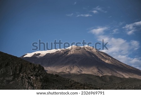 Mount Ararat with glacier and snow peak in nice sunny weather with blue sky and clouds