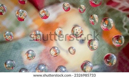 Water droplet background of harvest scarecrow face,