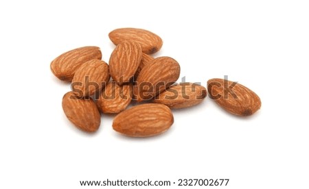 Almonds isolated on white background Royalty-Free Stock Photo #2327002677