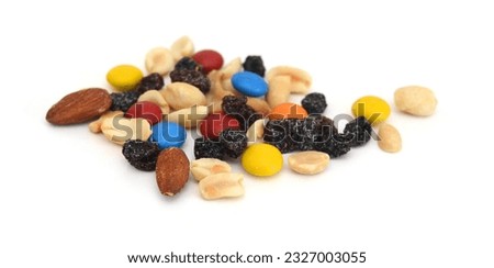 Mix nuts, dry fruits and grapes on a white background Royalty-Free Stock Photo #2327003055