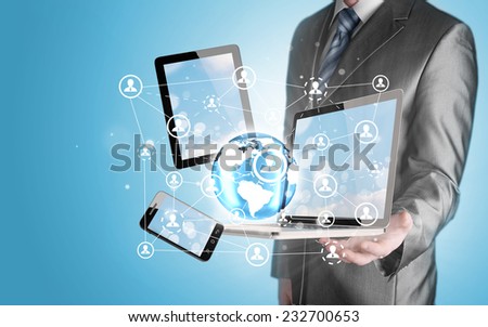 Business man using tablet PC and smartphone social connection