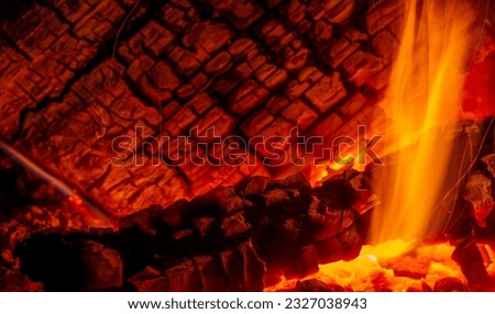 Fire in the fireplace. The illuminated area around the fire creates its own small zone In the firelight, it's easy to forget about everything that surrounds you (except your interlocutor, of course)