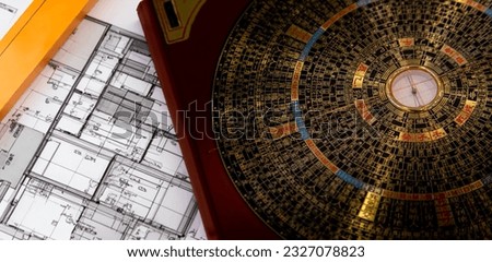 Antique chinese feng shui compass on home desing on background It's use for lucky in Chinese tradition property desing (Chinese alphabet means about direction) Royalty-Free Stock Photo #2327078823