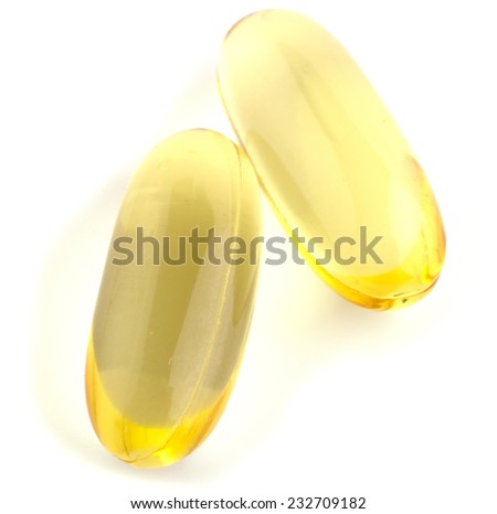Cod liver oil capsules isolated on white background cutout