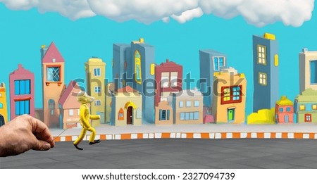 Man's hand holding with aluminum wire a figure for the stopmotion process with a drawn background of a city street with cartoon buildings. The 12 principles of animation. Royalty-Free Stock Photo #2327094739