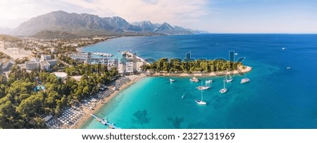 the essence of Kemer resort town, Turkey's coastal charm with our breathtaking aerial image showcasing its scenic landscapes and vibrant blue waters. Royalty-Free Stock Photo #2327131969