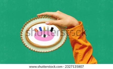Contemporary art collage with female hand holding small mirror with drawn female eye over green background. Doodles, sketches, cartoon drawing style. Human emotions
