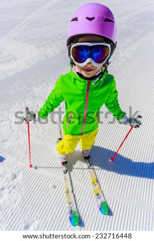 Skiing, winter, ski vacation - young skier on mountainside