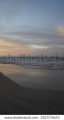 Sunset on the beach by the sea